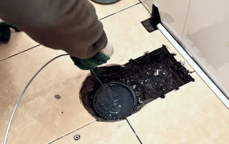 toilet-blocked-clearing-pipe